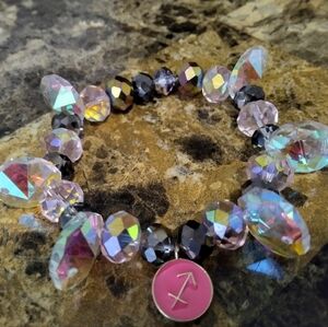 Iridescent Crystal Bracelet with Pink Charm
